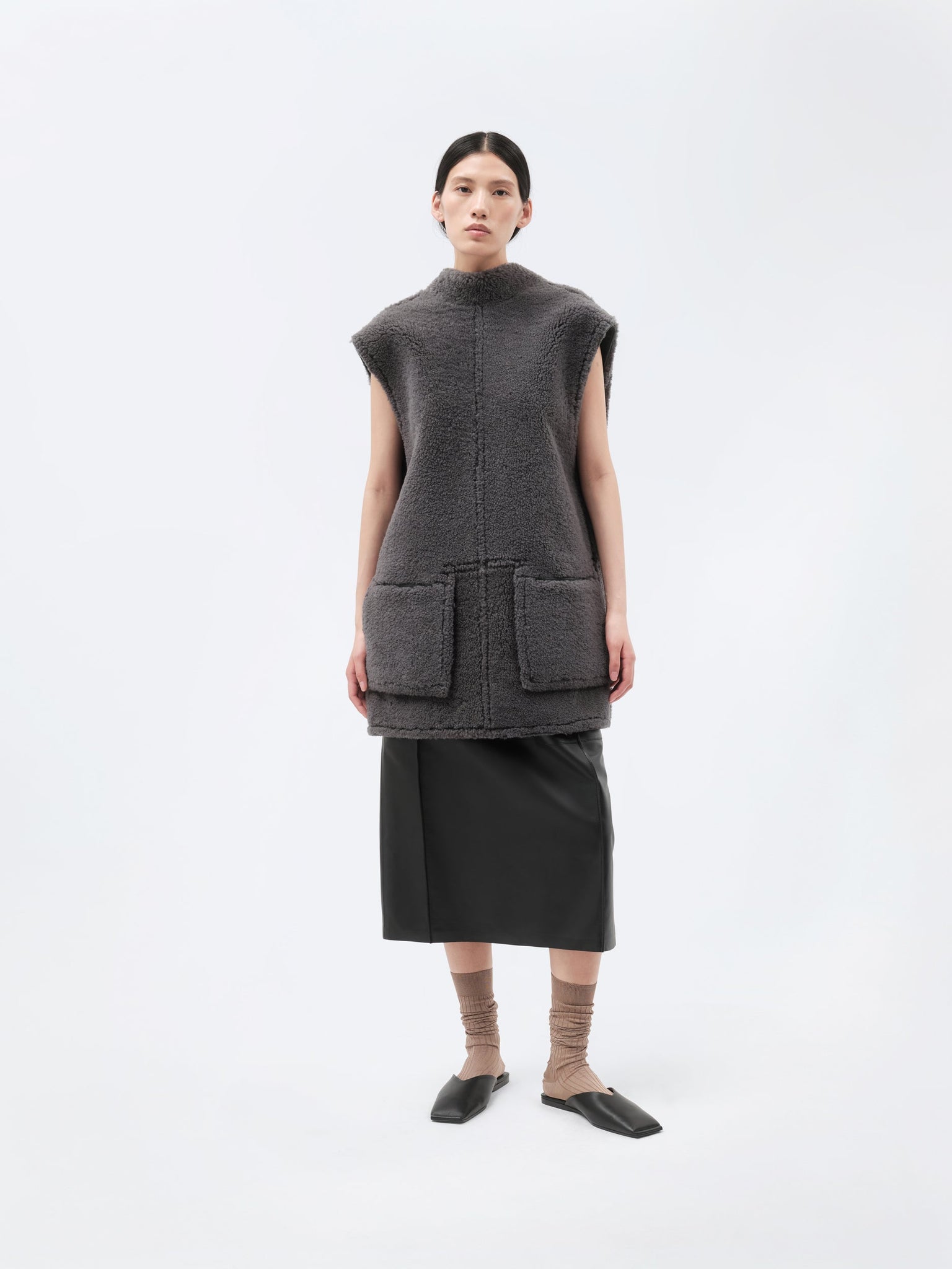 Veste sans manches en shearling bouclé