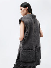 Veste sans manches en shearling bouclé