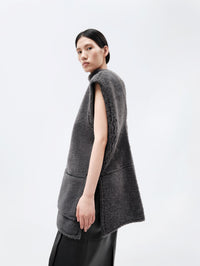 Veste sans manches en shearling bouclé
