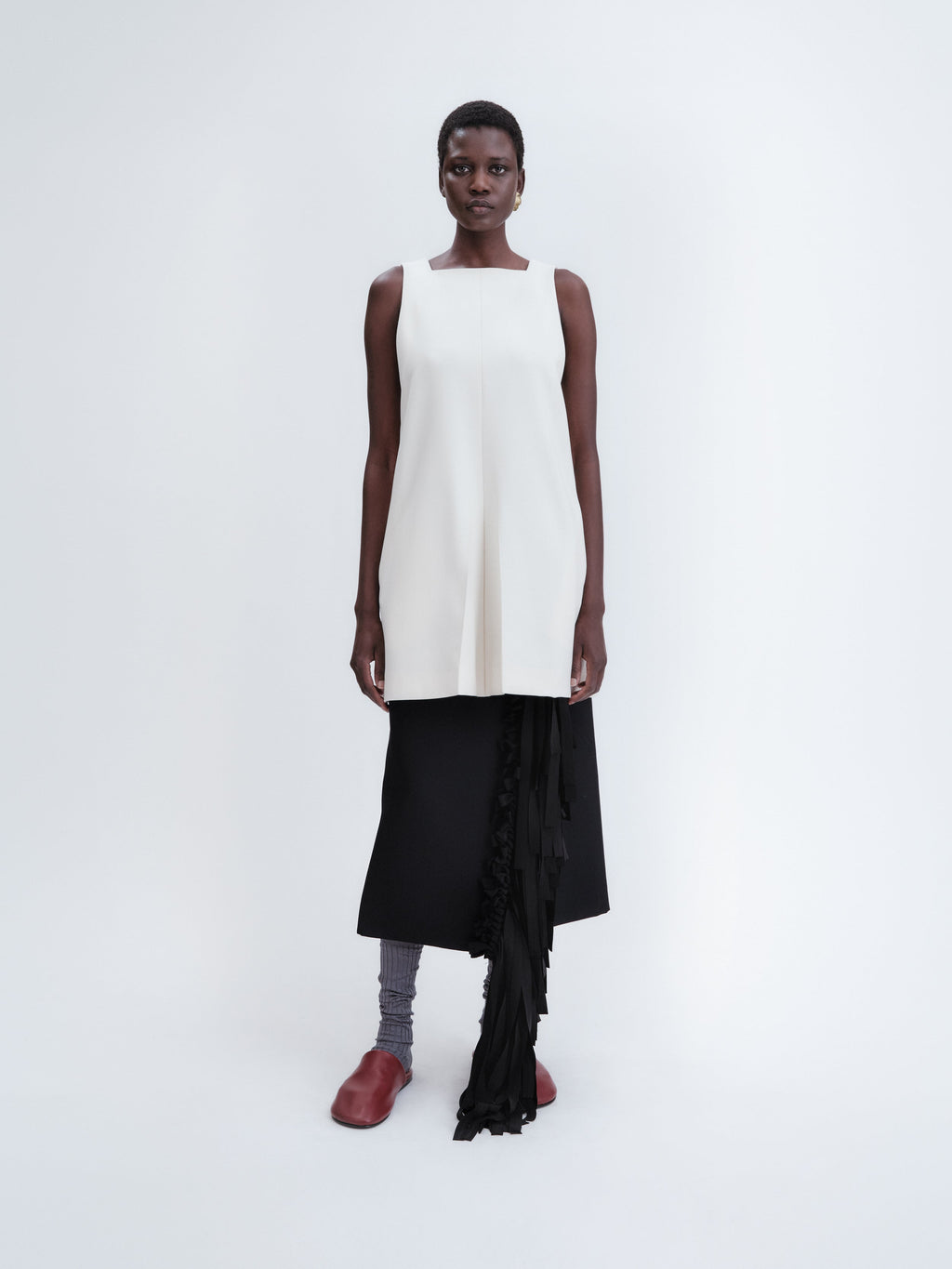 Short apron dress in crepe wool