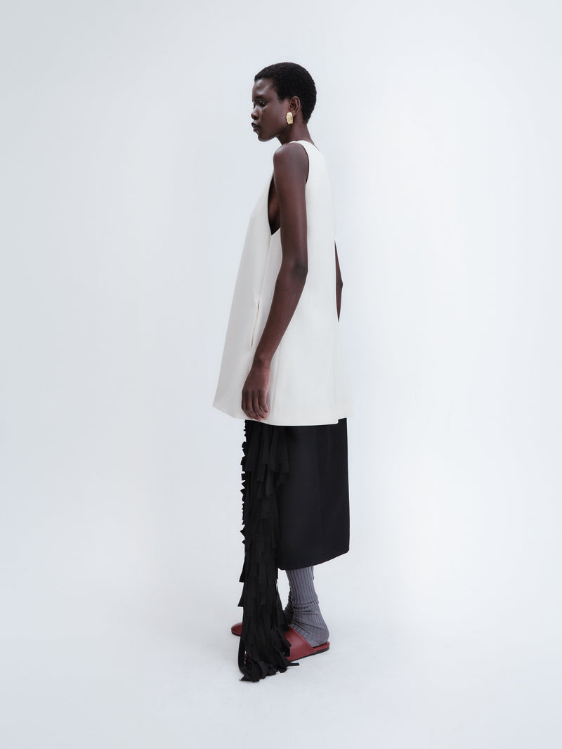 Short apron dress in crepe wool