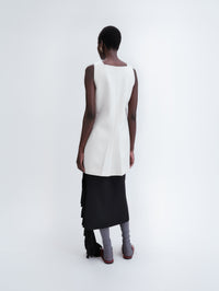 Short apron dress in crepe wool