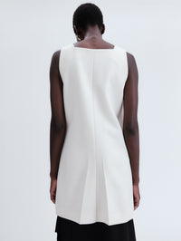 Short apron dress in crepe wool