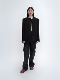 Veste déstructurée en laine bouclée