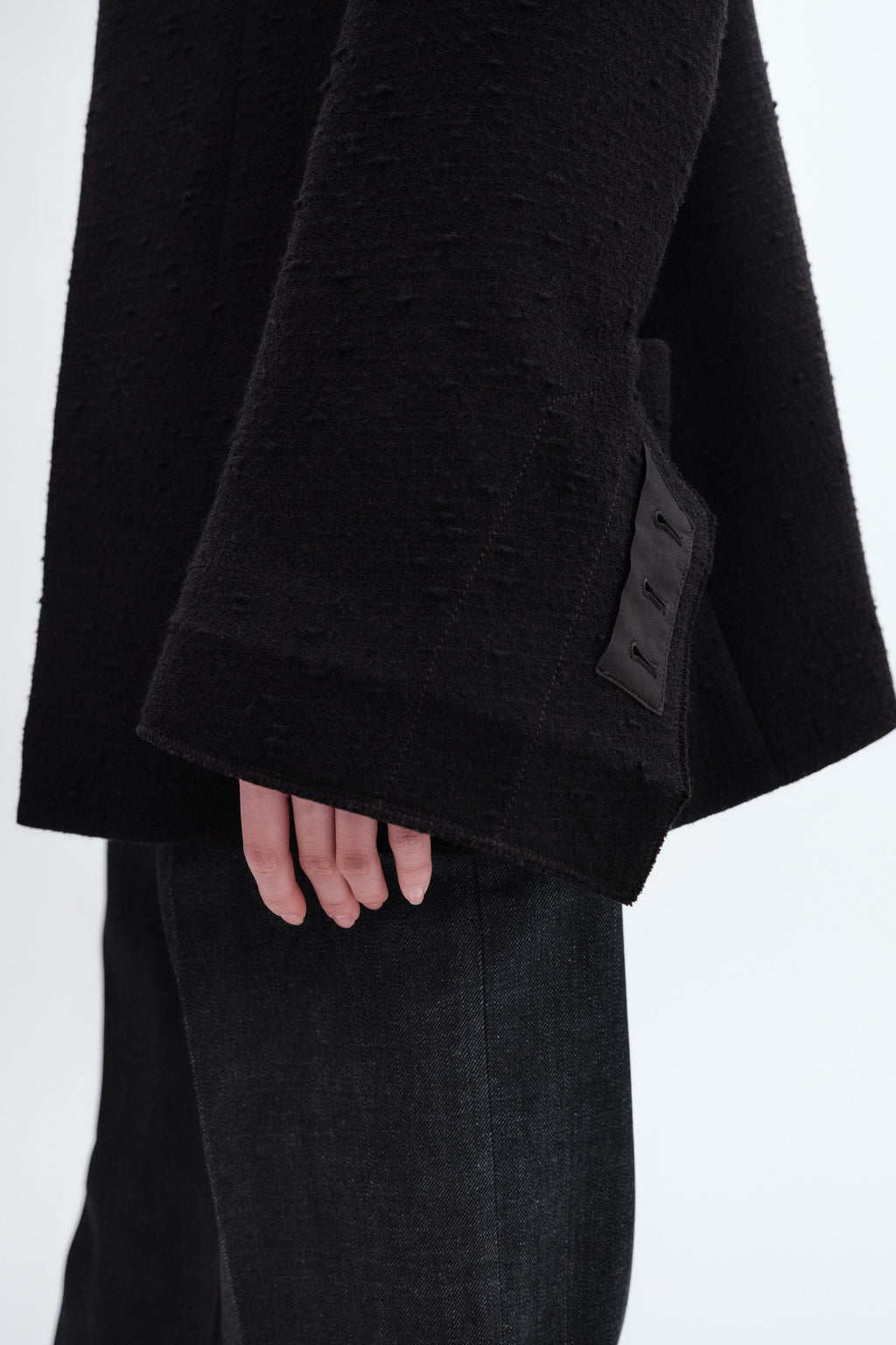 Veste déstructurée en laine bouclée