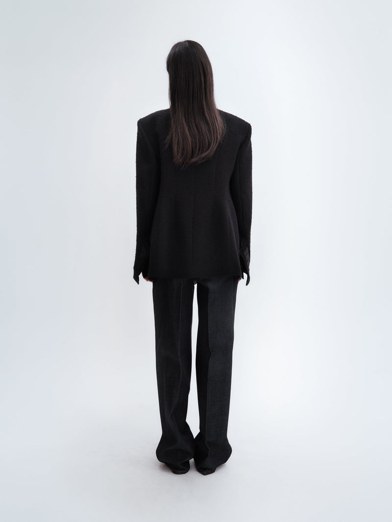 Veste déstructurée en laine bouclée