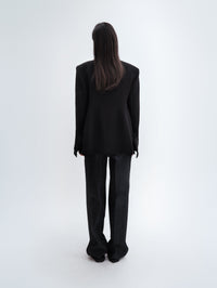 Veste déstructurée en laine bouclée