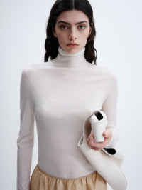 Sheer turtleneck knit in feather merino
