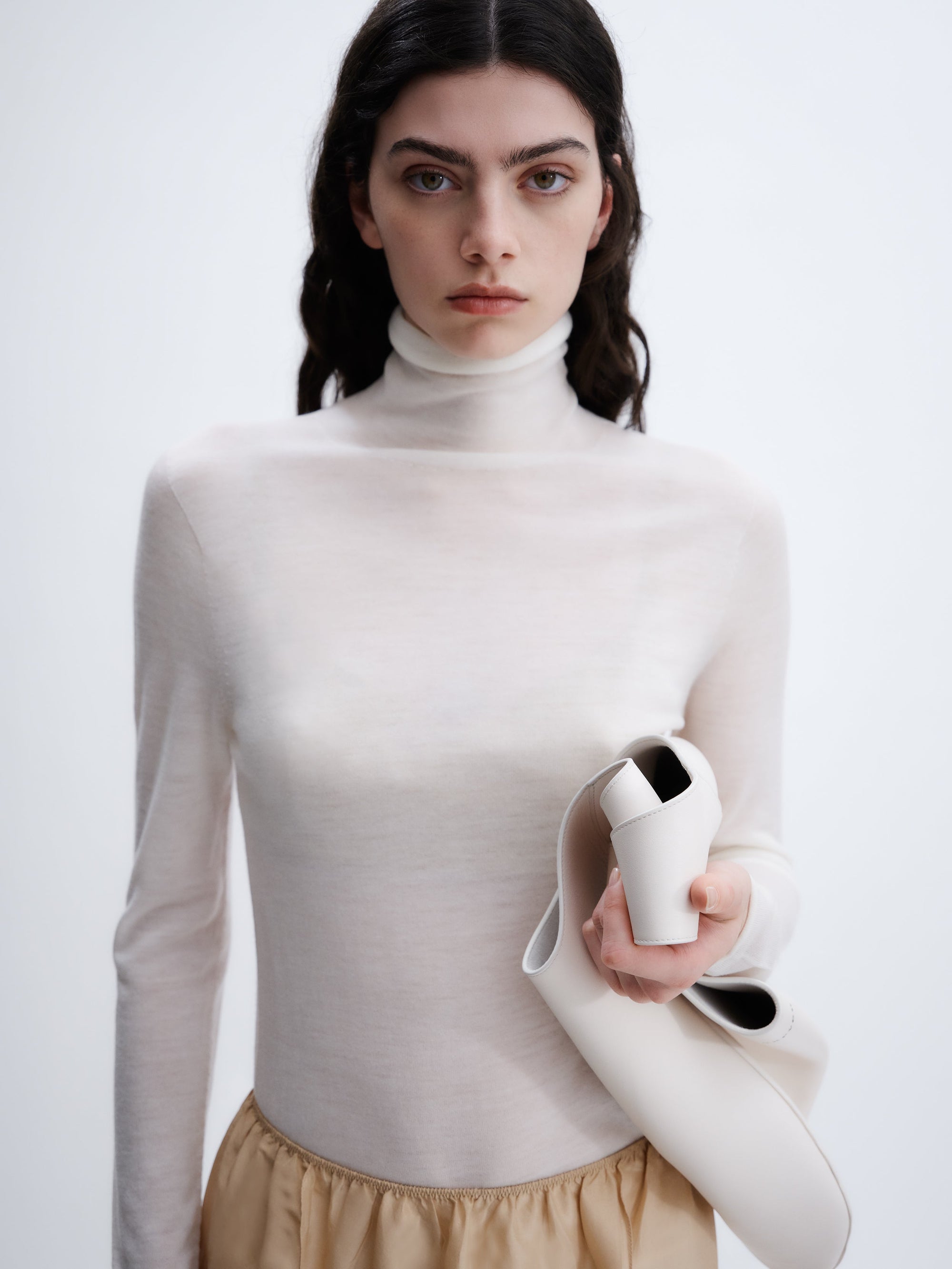 Sheer turtleneck knit in feather merino