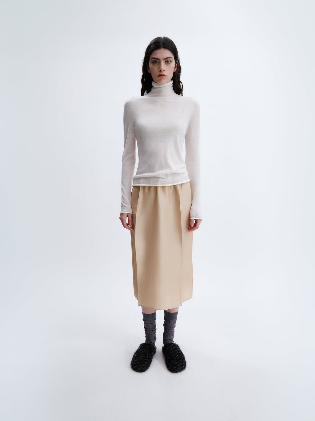 Sheer turtleneck knit in feather merino