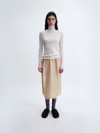 Sheer turtleneck knit in feather merino