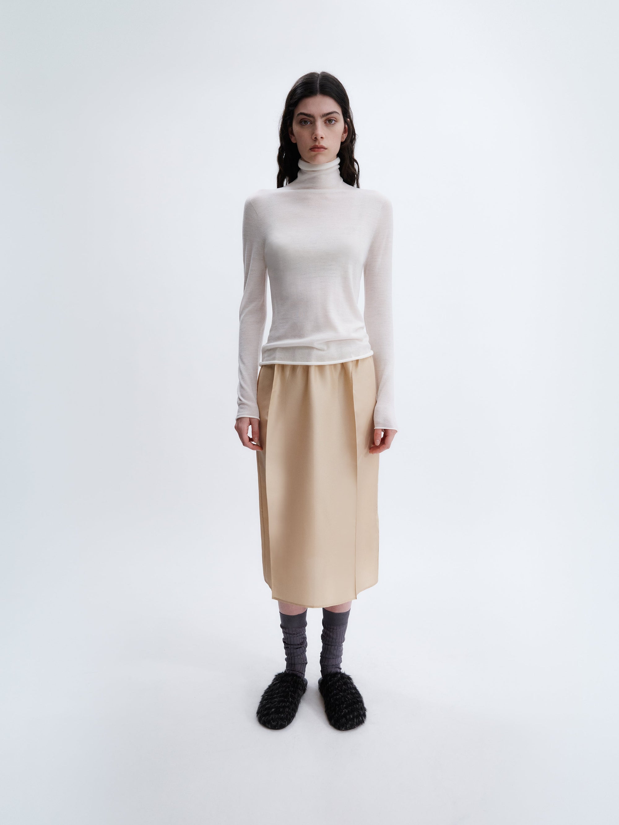 Sheer turtleneck knit in feather merino