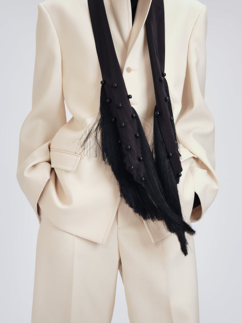 Embroidered fringed scarf in crepe de chine