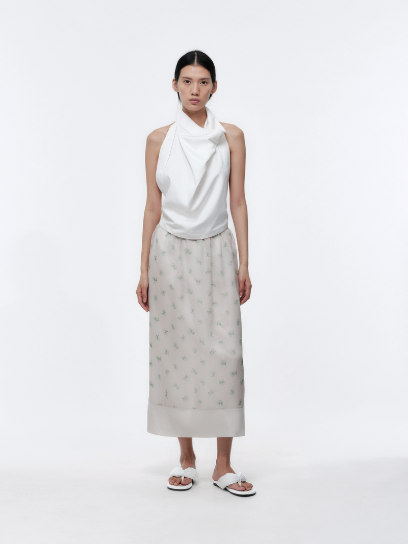 Jupe transparente en organza de satin imprimé orchidée