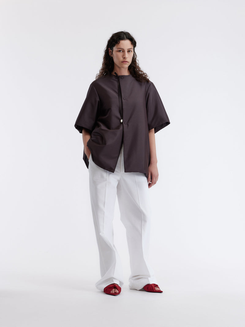 Manteau manches courtes ouatiné en soie technique