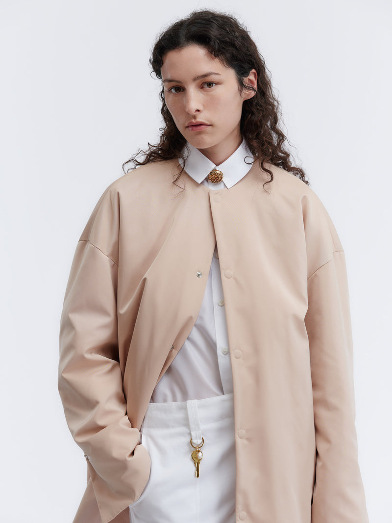 Manteau court ouatiné en duchesse