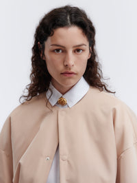 Manteau court ouatiné en duchesse