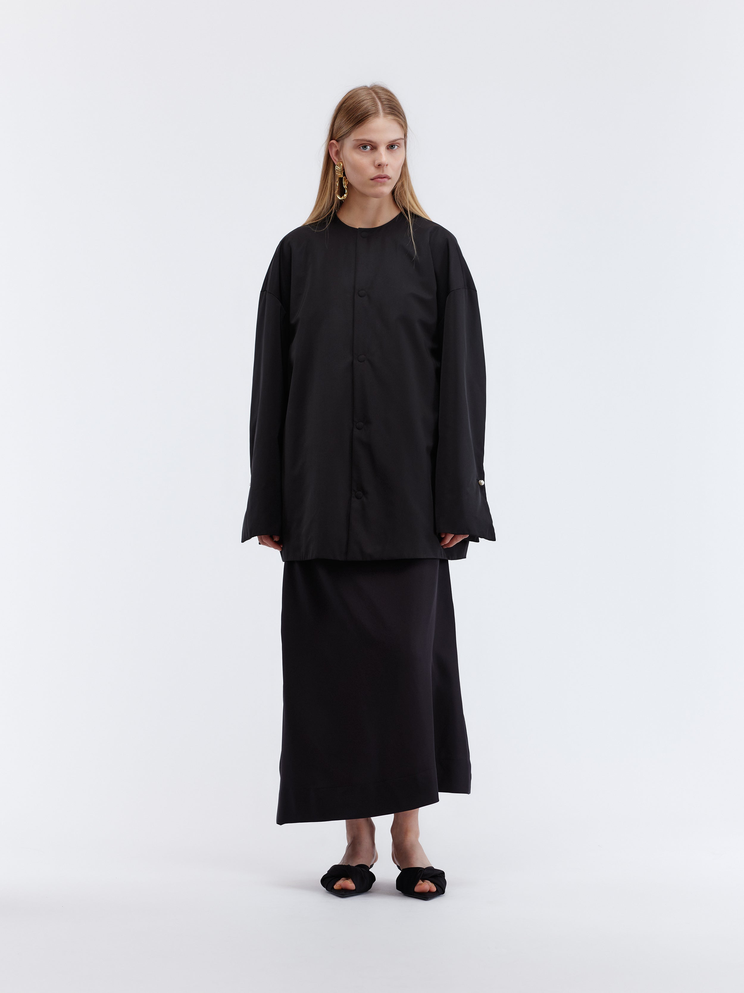 Manteau court ouatiné en duchesse