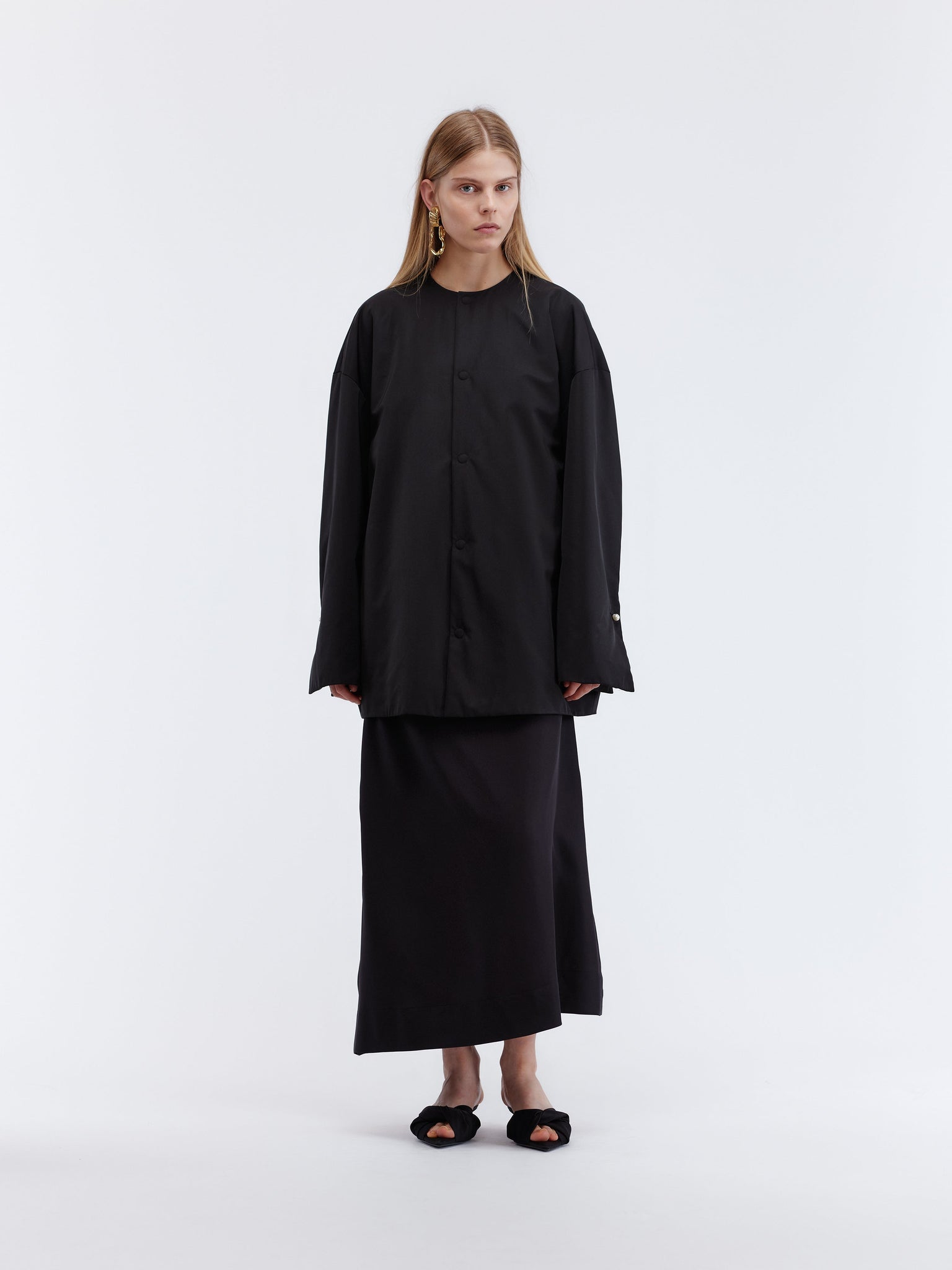 Short padded coat in duchesse