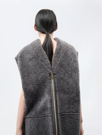Veste sans manches en shearling bouclé