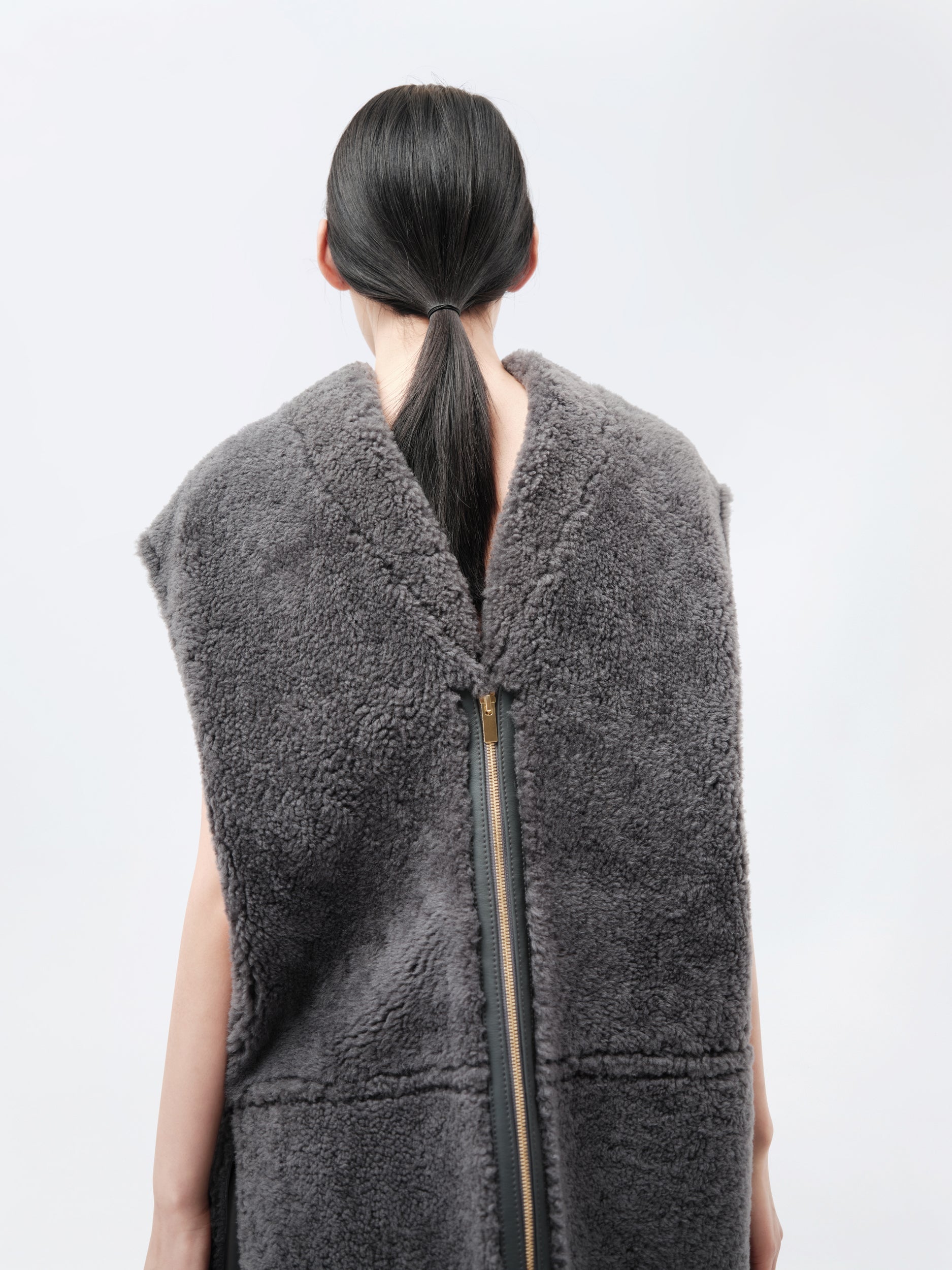 Veste sans manches en shearling bouclé
