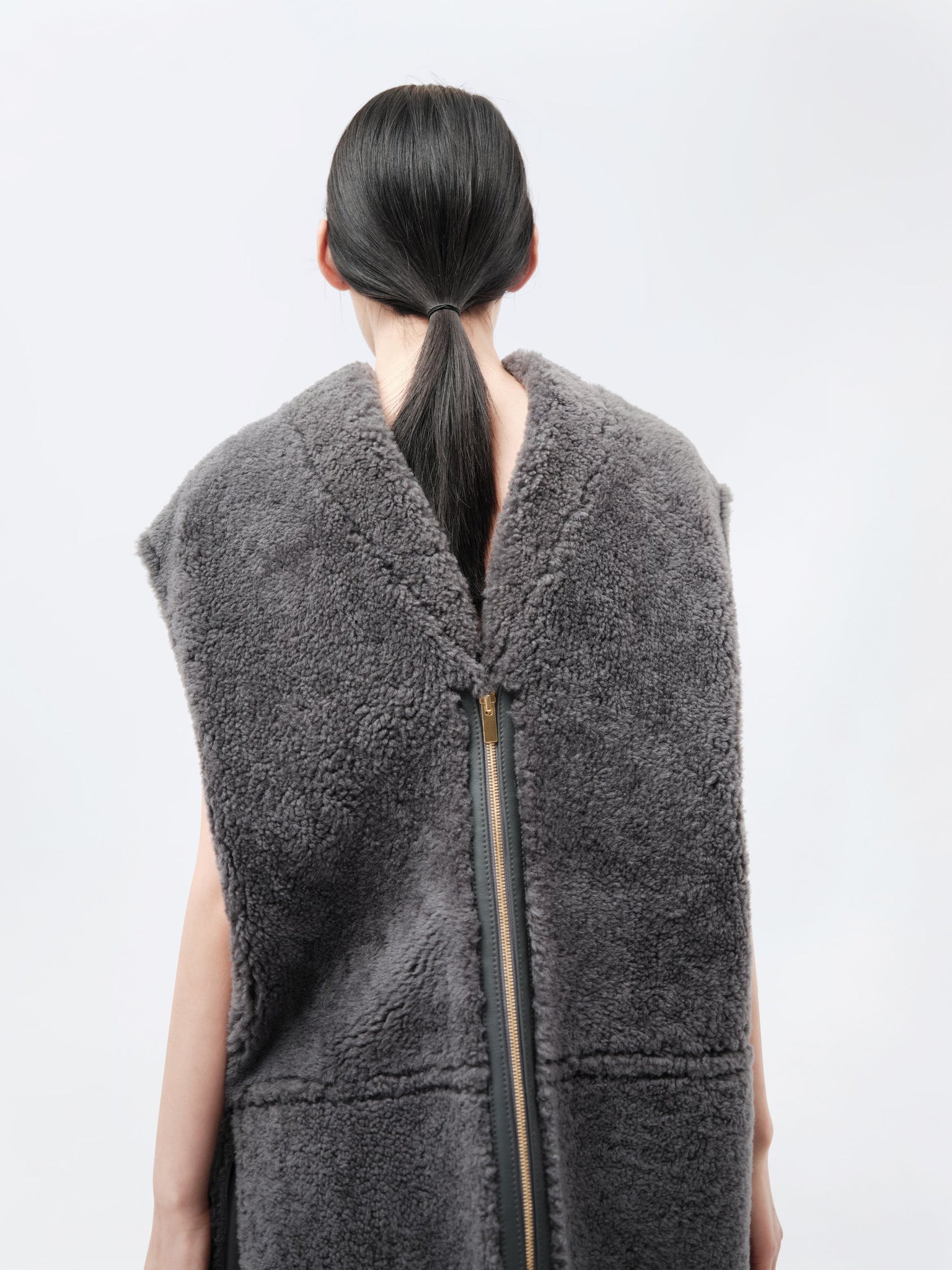 Veste sans manches en shearling bouclé