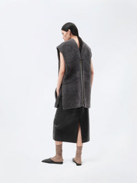 Veste sans manches en shearling bouclé