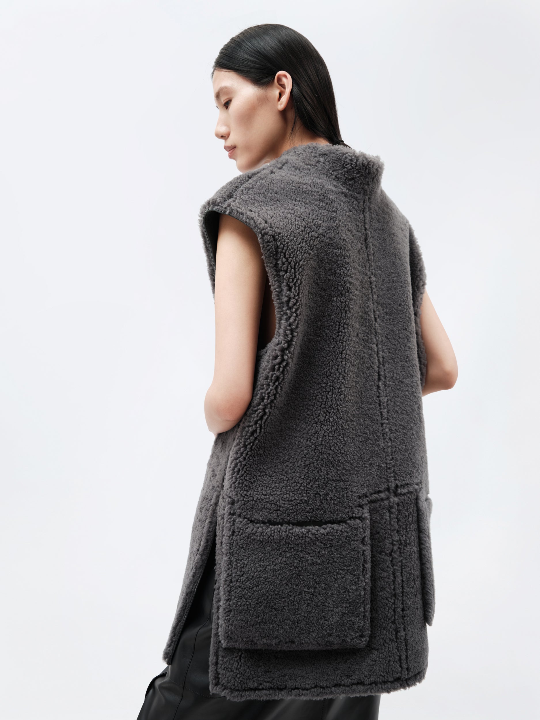 Veste sans manches en shearling bouclé