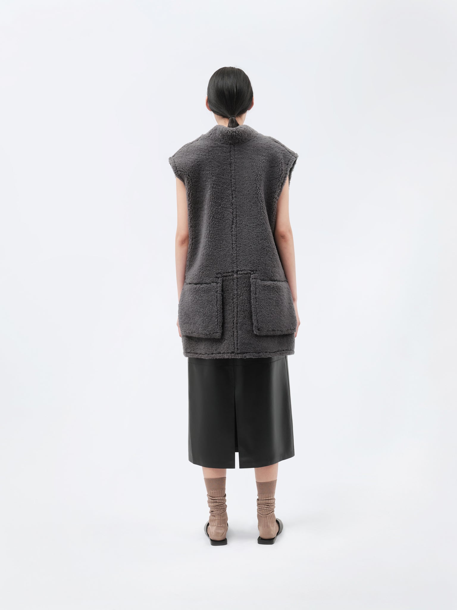 Veste sans manches en shearling bouclé