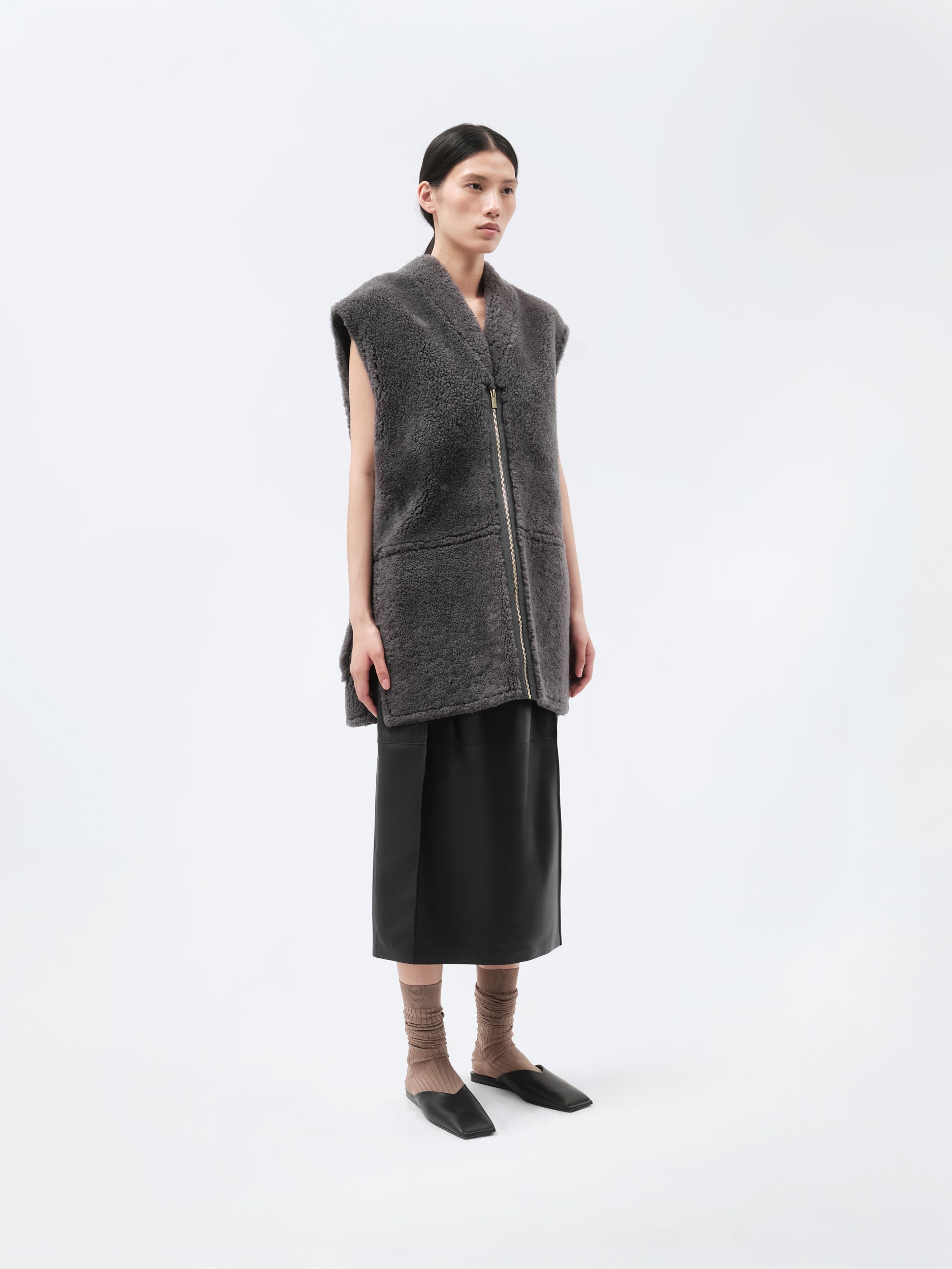 Veste sans manches en shearling bouclé