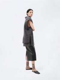 Veste sans manches en shearling bouclé