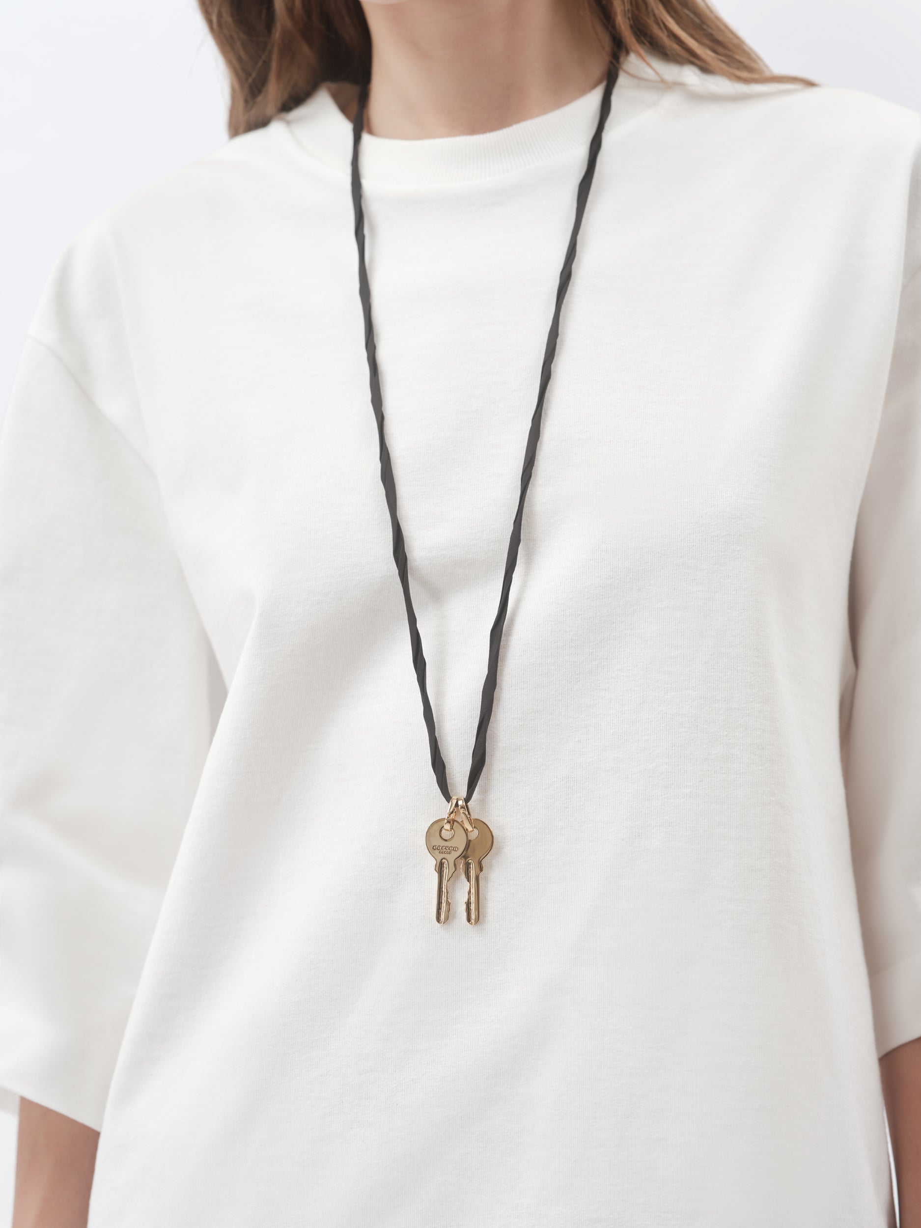 Pendentif talisman Clés en laiton doré