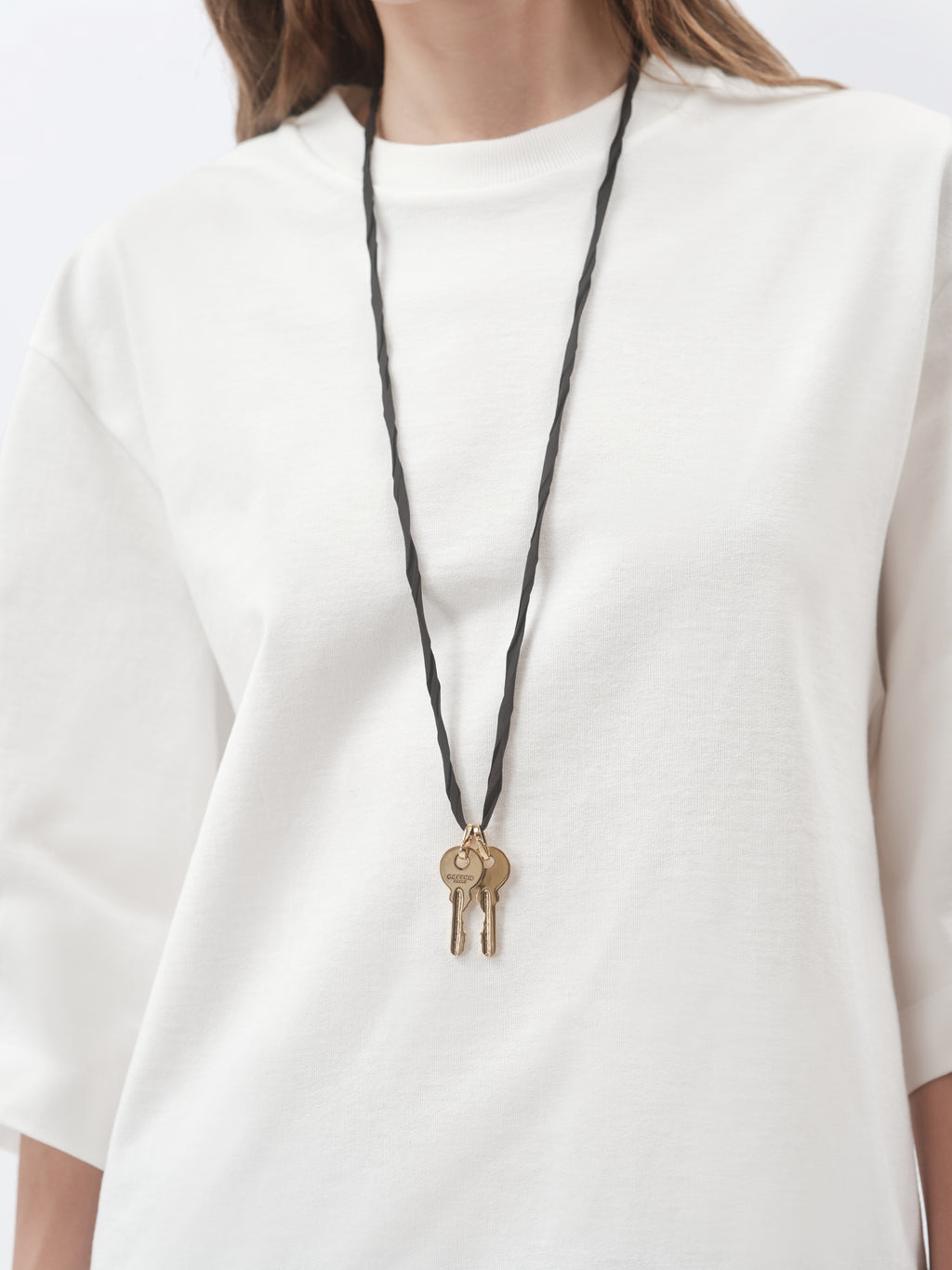 Pendentif talisman Clés en laiton doré