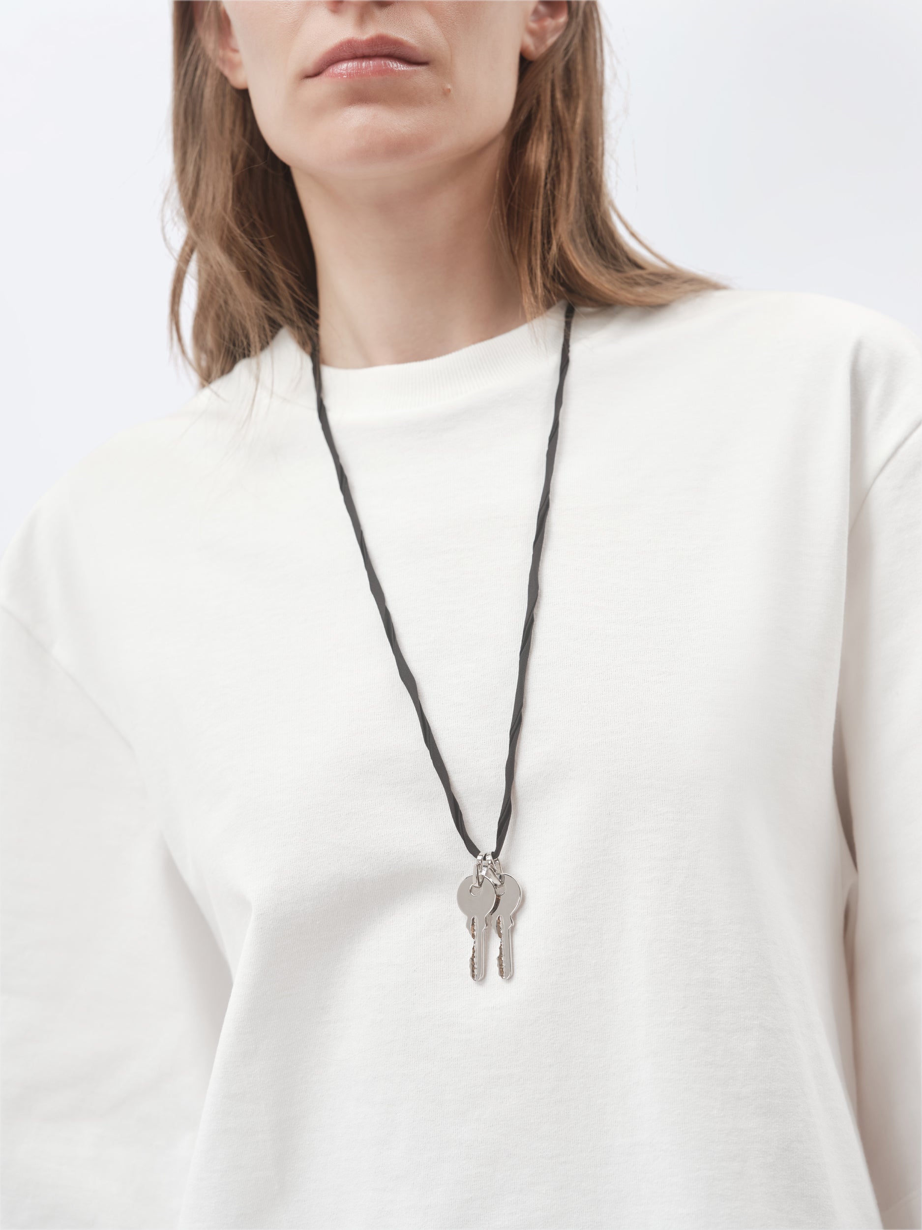 Pendentif talisman Clés en laiton argenté
