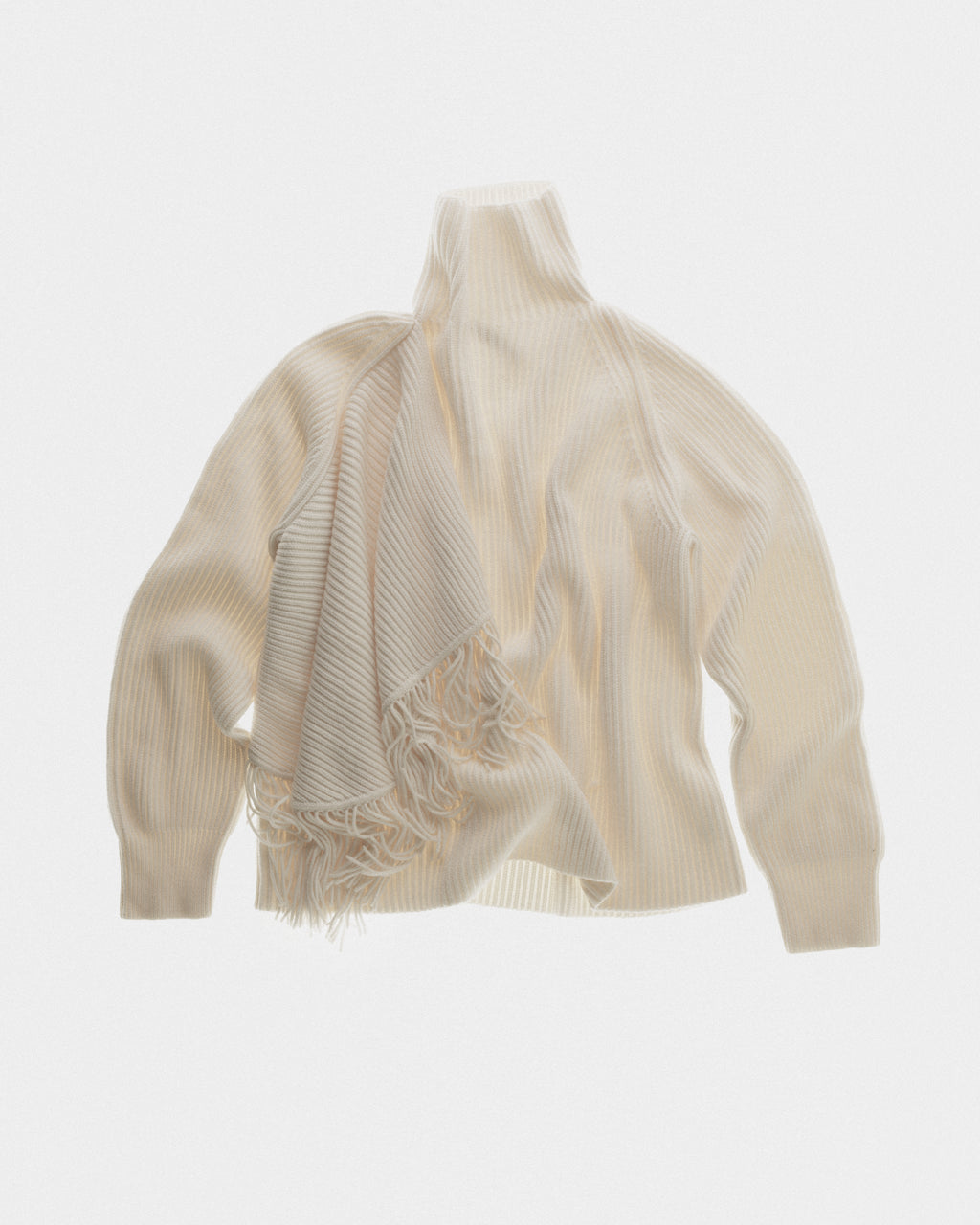 Fringed high neck jumper in fisherman rib and fringes
