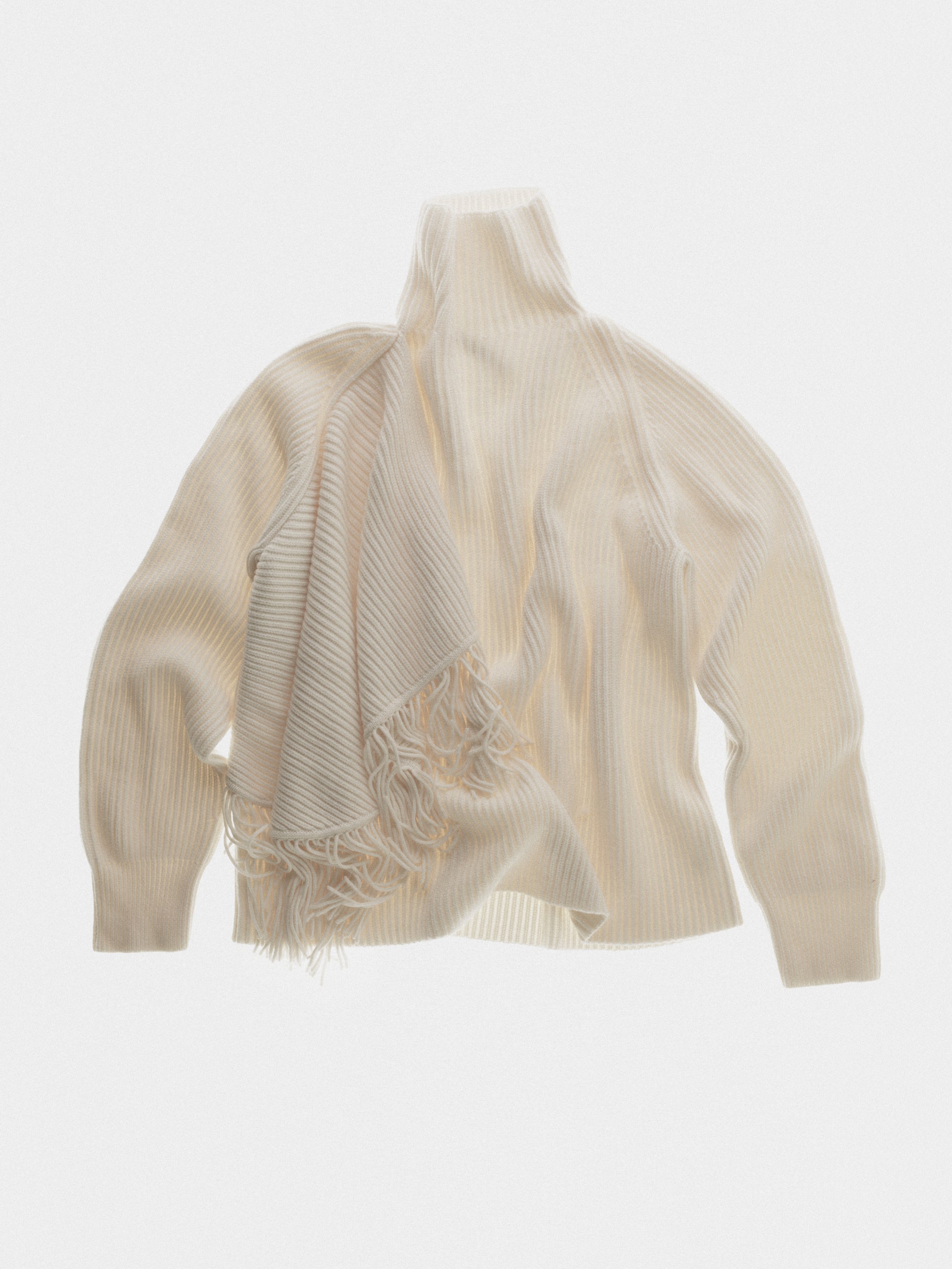 Fringed high neck jumper in fisherman rib and fringes