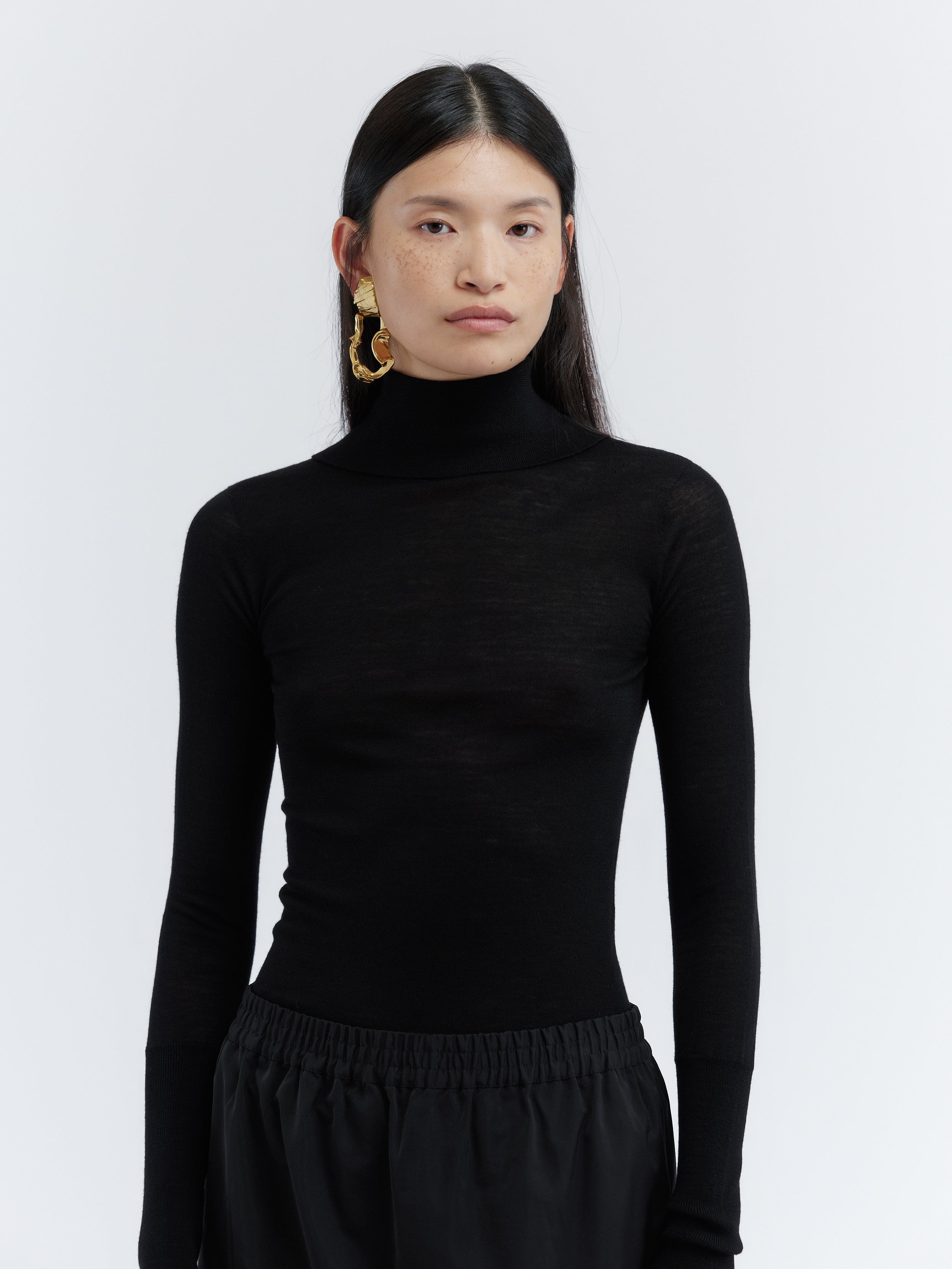 Turtleneck jumper in feather merino
