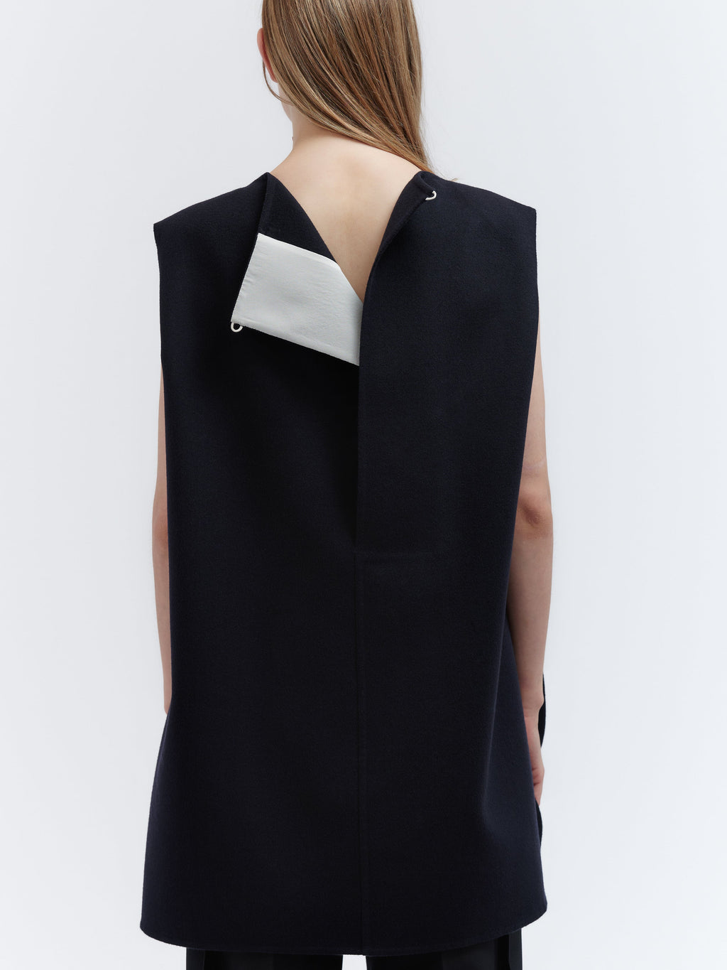 Sleeveless tunic in light double face wool