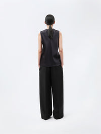 Pantalon à plis en toile de soie et laine