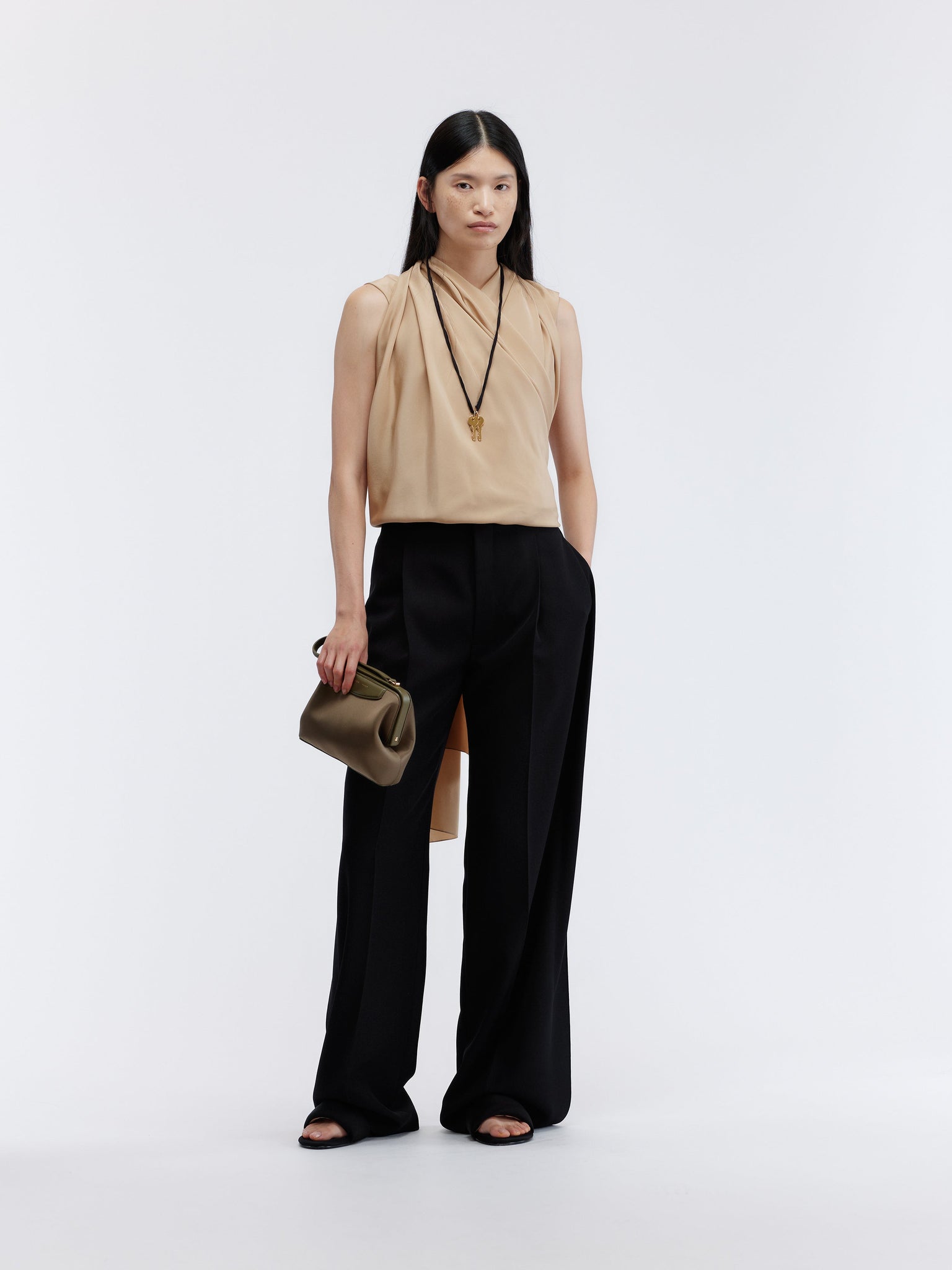 Deconstructed trousers in grain de poudre