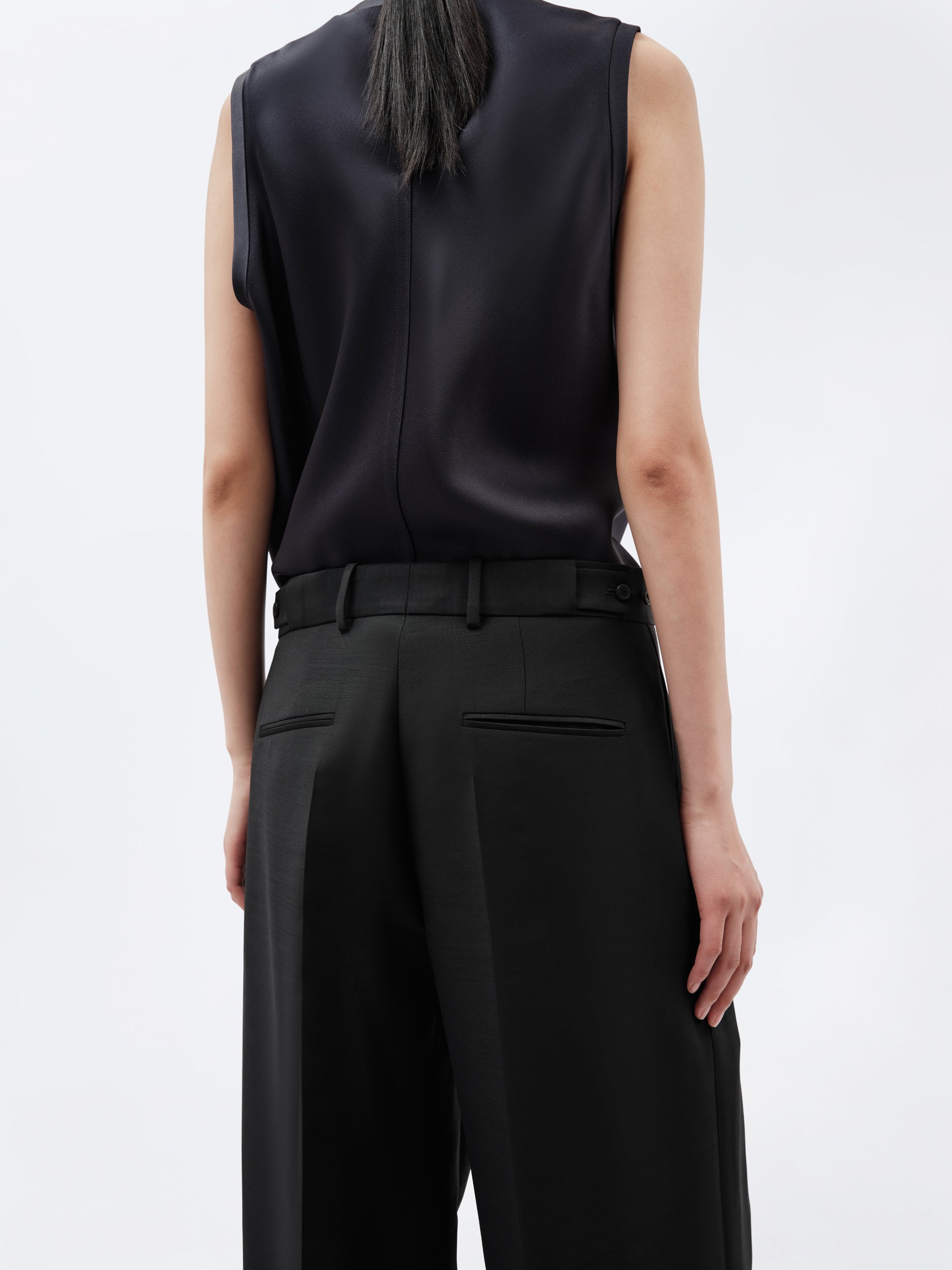 Pantalon à plis en toile de soie et laine