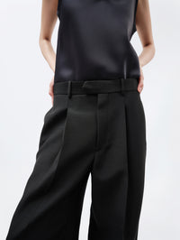Pantalon à plis en toile de soie et laine