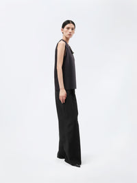 Pantalon à plis en toile de soie et laine